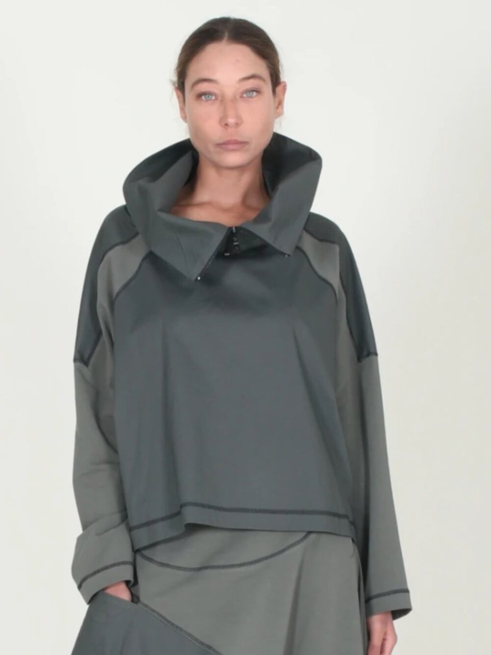 Amma Kedem Sasson funnel cowl neck zipper two tone top architectural